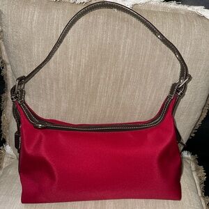 Pre owned shoulder bag with adjustable shoulder strap
